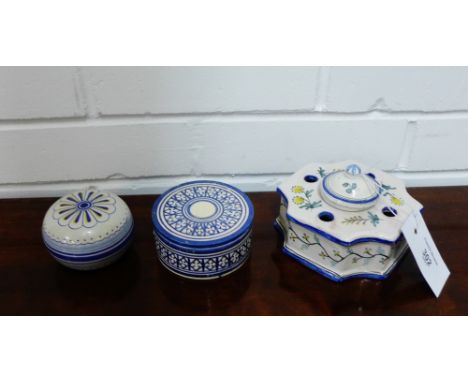A French Faience ink well painted with yellow flowers, together with a Deruta trinket jar and cover and another (3) 