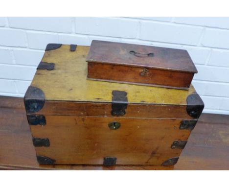 An iron bound storage trunk with handles to side, 45 x 27cm, together with a smaller wooden rectangular box with a small bras