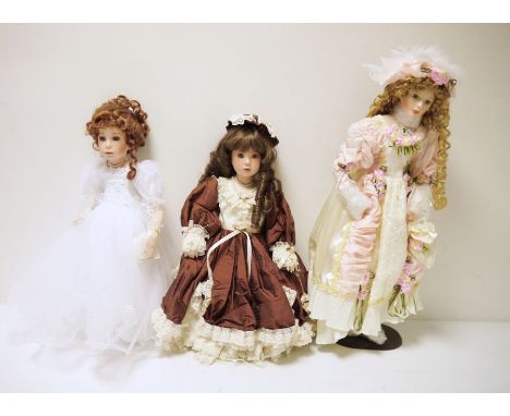 The Palmary Collection collectors doll, and two other porcelain collectors dolls and a Pelham Puppet boxed 'MacBoozle', 'The 