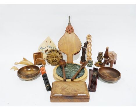 Carved wooden model of an elephant, various turned wooden bowls, pair of bellows, a large wicker basket, etc.