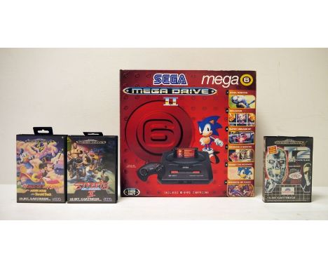 Sega Mega Drive II&nbsp;mega 6 boxed with three games 'Streets of Rage II', 'World of Illusion' and 'T2'&nbsp;Condition Repor