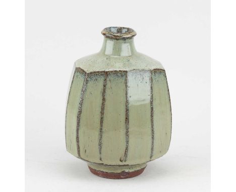 † PHIL ROGERS (1951-2020); a faceted stoneware bottle covered in nuka glaze, impressed PR mark, gallery sticker, height 18.5c