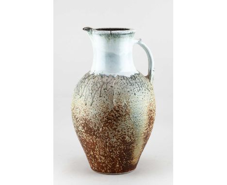 † DAVID FRITH (born 1943) for Brookhouse Pottery; a very large stoneware jug covered in crawling green ash glaze with iron st
