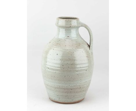 † RAY FINCH (1914-2012) for Winchcombe Pottery; a large stoneware jug covered in speckled grey glaze, impressed WP. mark, hei