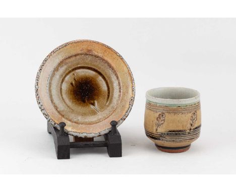 † PHIL ROGERS (1951-2020); a stoneware yunomi covered in green ash glaze with impressed and combed decoration, impressed PR m