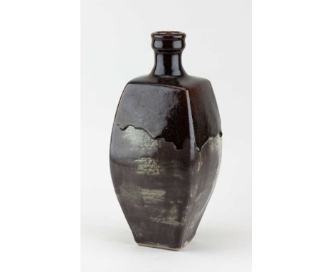 † JOANNA WASON (born 1952) for Leach Pottery; a square stoneware bottle covered in mottled grey glaze with tenmoku breaking t