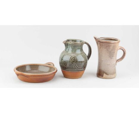 † MICHAEL CASSON (1925-2003); a salt glazed jug, impressed MC mark, height 18cm, a slightly smaller Winchcombe Pottery jug, a