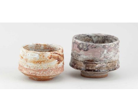 † ROBIN WELCH (1936-2019); a stoneware footed bowl with textured surface partially covered in mottled pale grey and lilac gla