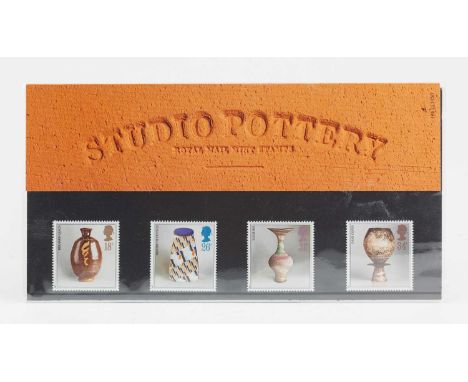 'Studio Pottery', a presentation pack of four stamps designed by Tony Evans featuring works by Bernard Leach, Elizabeth Frits