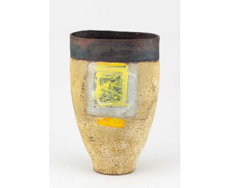 † ROBIN WELCH (1936-2019); a tall stoneware vessel squeezed to an oval rim covered in mottled oatmeal glaze with bronze rim, 