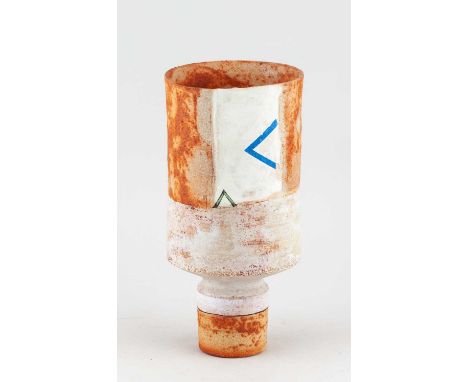 † ROBIN WELCH (1936-2019); a cylindrical stoneware vessel on drum base covered in oatmeal and rusty glaze with a band of mott