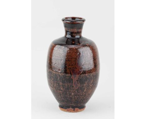 JIM MALONE (born 1946); a stoneware bottle covered in tenmoku breaking to kaki glaze with wax resist decoration, impressed JM