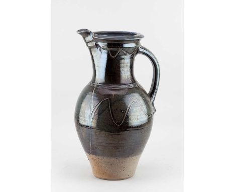 † MICHAEL CASSON (1925-2003); a very tall salt glazed jug with incised decoration, impressed MC mark, height 45.5cm.Provenanc