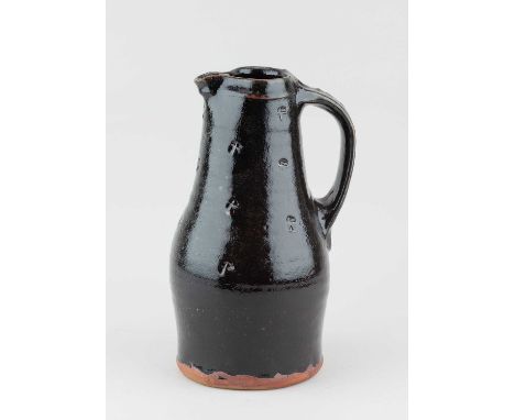 JIM MALONE (born 1946); a stoneware baluster jug covered in tenmoku breaking to kaki glaze with impressed decoration, impress