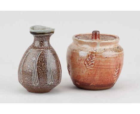 † PHIL ROGERS (1951-2020); a stoneware jar and cover covered in shino glaze with impressed decoration, impressed PR mark, hei