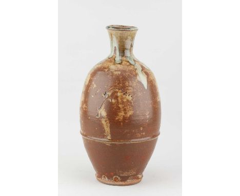 † JIM MALONE (born 1946); a large stoneware bottle covered in green ash and iron glaze with nuka top and incised decoration, 