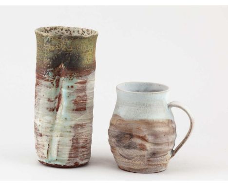 † RACHEL WOOD (born 1962); a cylindrical stoneware vessel with textured surface covered in layered slips and glaze, height 17