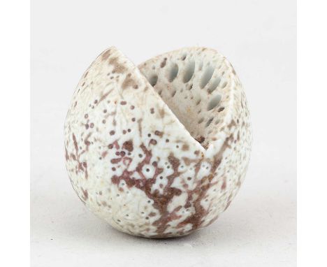 † ALAN WALLWORK (1931-2019); a small porcelain split pebble form partially covered in iron red glaze, incised AW mark, height