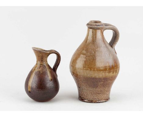 † JOHN LEACH (1939-2021) for Muchelney Pottery; a stoneware jug partially covered in running green ash glaze, impressed JHL a