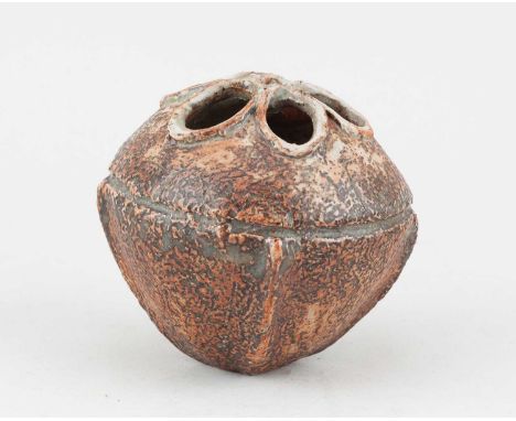 † ALAN WALLWORK (1931-2019); a stoneware seed pod form covered in iron staining, incised AW mark, height 10.5cm.   Condition 