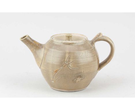 JIM MALONE (born 1946); a porcelain teapot covered in celadon glaze with incised decoration, impressed JM and L (for Lessonha