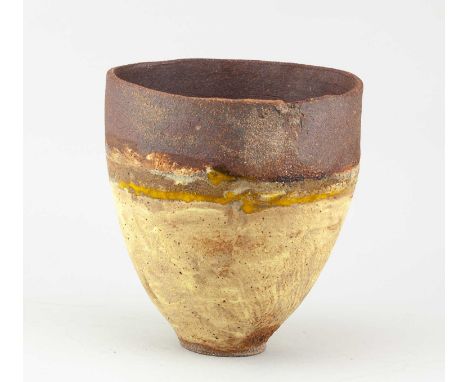 † ROBIN WELCH (1936-2019); a stoneware vessel partially covered in pale yellow glaze with yellow enamel decoration, impressed