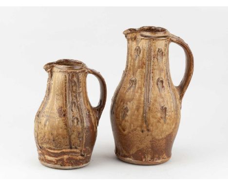 JIM MALONE (born 1946); a stoneware baluster jug covered in oatmeal and iron glaze with applied decoration, impressed JM and 