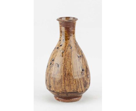 † PHIL ROGERS (1951-2020); a stoneware Korean bottle partially covered in green ash glaze over iron slip with incised decorat