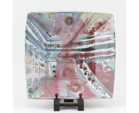 † MARIANNE DE TREY (1913-2016); a large square stoneware footed dish covered in polychrome glaze, impressed shell mark, 31 x 