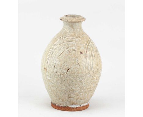 † MIKE DODD (born 1943); an ovoid stoneware bottle covered in willow ash glaze with incised decoration, impressed MJD mark, h