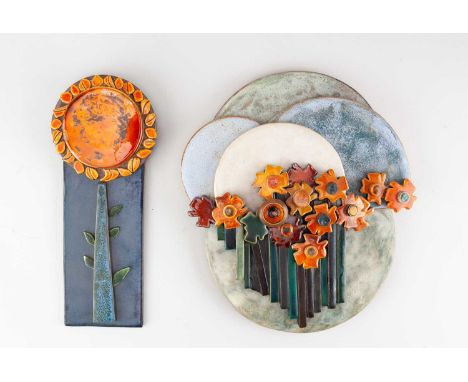 † ANNE PLANT (1934-2019); a stoneware wall hanging of flowers, pottery sticker, height 29cm, and a smaller hanging of a sunfl