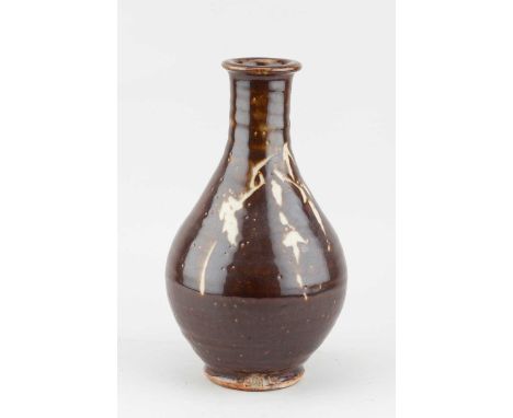 JIM MALONE (born 1946); a stoneware Korean bottle covered in kaki glaze with wax resist decoration, impressed JM and L (for L