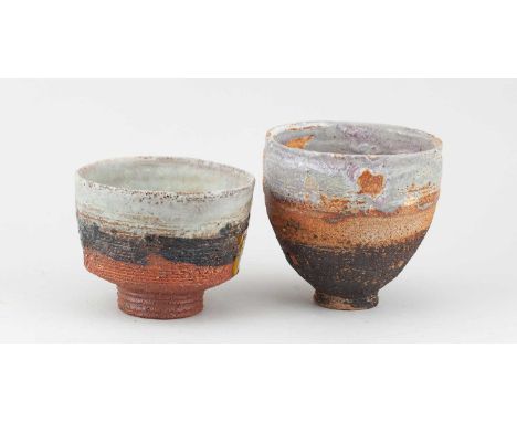 † ROBIN WELCH (1936-2019); a stoneware vessel partially covered in black glaze with pale grey and lilac rim, height 11.5cm, a