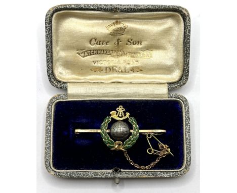 A yellow metal, green enamel and metal sweetheart brooch, in a vintage jewellery box, with retail mark for Cave & Son 