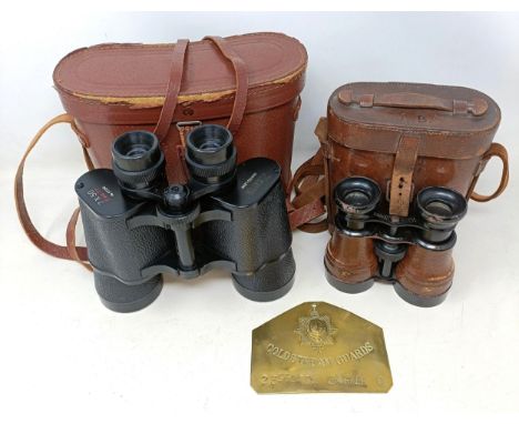 A Coldstream Guards brass bed plaque, 23969434 Barker C, a pair of Zenith 7 x 50 binoculars, cased, and another pair similar 