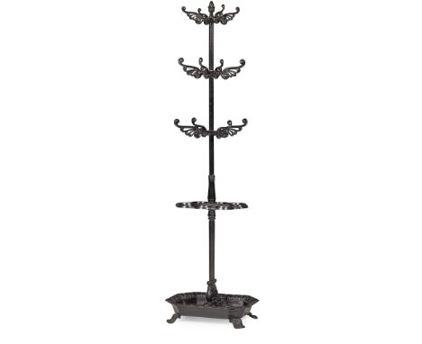 REGENCY CAST IRON COAT AND STICK STAND EARLY 19TH CENTURY with three tiers of scrolled branches above a stick holder and drip