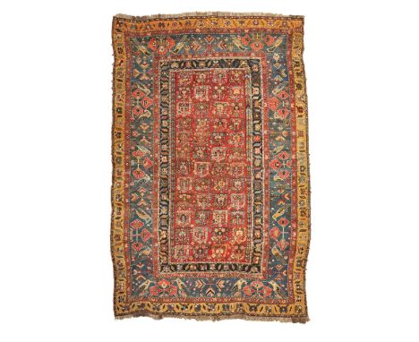 KASHKULI CARPET SOUTH PERSIA, LATE 19TH/EARLY 20TH CENTURY the red field with allover boteh pattern, within slate blue border