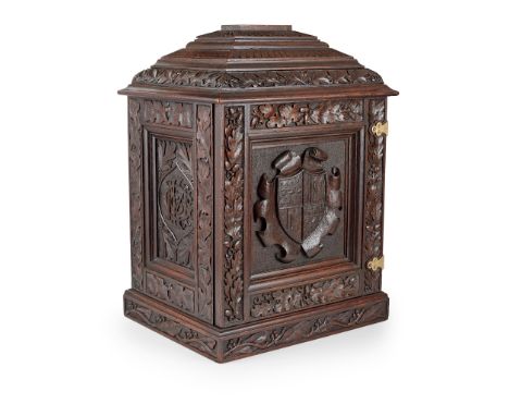 LARGE VICTORIAN CARVED OAK TABLE CABINET/ HUMIDOR 19TH CENTURY the moulded and carved stepped top above a single door centred