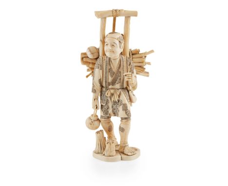 Y LARGE JAPANESE IVORY OKIMONO OF A WOOD CARRIER, SIGNED GYOKUSHI MEIJI PERIOD carved as a walking man with logs on his back,