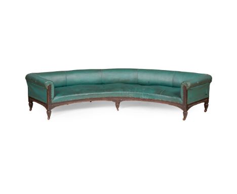 VICTORIAN LARGE MAHOGANY FRAMED CURVED BANQUETTE SOFA 19TH CENTURY the low curved padded back and arms above a padded curved 