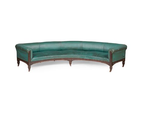 VICTORIAN LARGE MAHOGANY FRAMED CURVED BANQUETTE SOFA 19TH CENTURY the low curved padded back and arms above a padded curved 