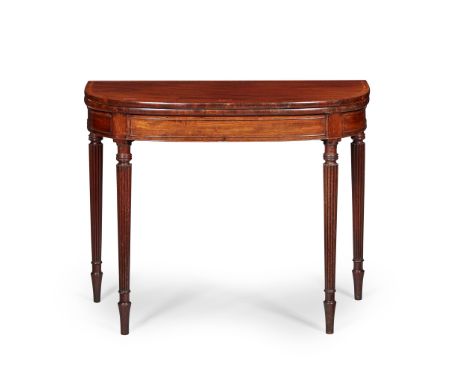 REGENCY MAHOGANY AND SATINWOOD TEA TABLE EARLY 19TH CENTURY the D shaped fold-over top with crossbanding, on ring turned and 