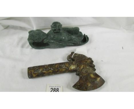  A Chinese archaistic Shang Dynasty-style mottled brown and caramel jade ceremonial axe with mythical dragon carp head and bi