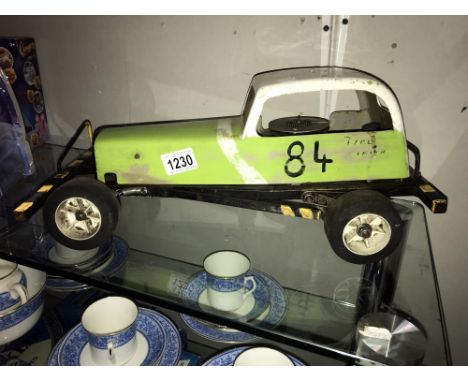 A petrol engine model car.