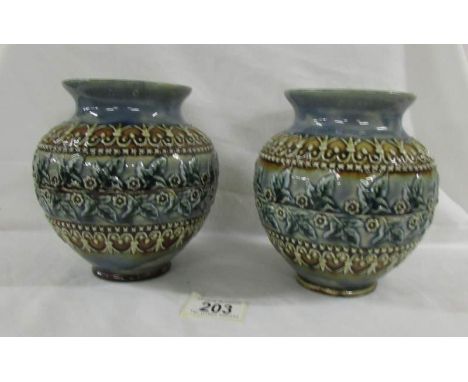 A pair of lovery 15.5 cm Doulton Lambeth bowls with various markings on base of each.  One has Kate M Davies &amp; Mary Buddo