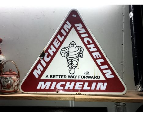 A Michelin enamel sign.