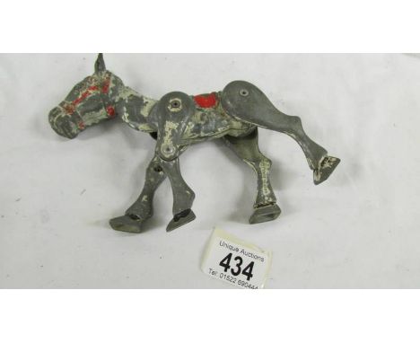 An early die cast Moko Muffin the Mule string puppet.