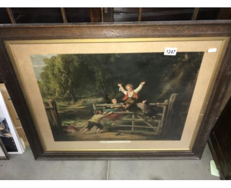 An Edwardian oak framed print 'Happy as a King', children playing on a farm gate. ****Condition report**** Frame in good cond