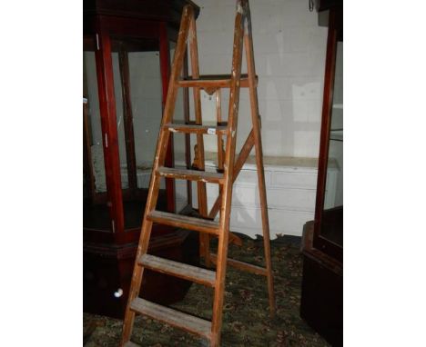 A wooden step ladder.