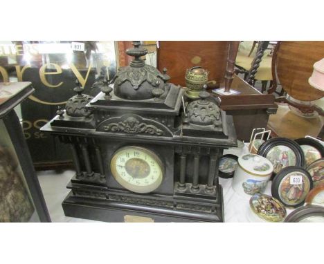A Victorian black marble Paladian style 8 day mantel clock.